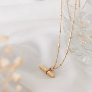 image of 18K gold plated tbar Patience & Prayer necklace