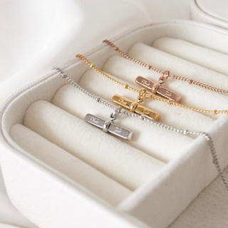 Trio of 'patience & prayer' islamic bracelets in gold, silver and rose gold