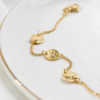 Islamic bracelet in gold with 'happiness' engraved in Arabic