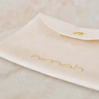 soft pouch that Nimah jewellery arrives in